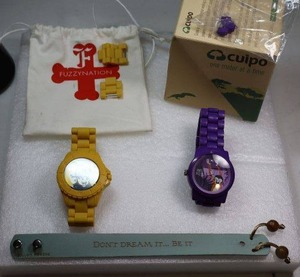 lot 267 image: Jewelry Purple Culpo watch and yellow Fuzzy Nation watch, and leather bracelet