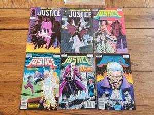 lot 102 image: Selection of vintage Marvel Comics - Justice