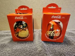 lot 48 image: Selection of 2 vintage 1993 Enesco Coca Cola handmade decoupage Christmas Ornaments
