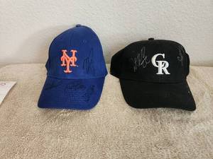 lot 83 image: Selection of 2 signed baseball hats - New York Mets & Colorado Rockies - these were signed at Walter Reed Hospital for my brother who was a patient there back in early 2000s