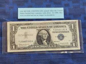 lot 130 image: 1957 B Silver Certificate $1 dollar bill