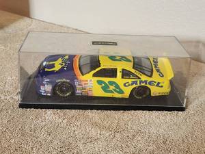 lot 29 image: Limited Edition Jimmy Spencer #23 - Action 124 diecast - Ford Thunderbird - Somin Joe Camel cigarettes