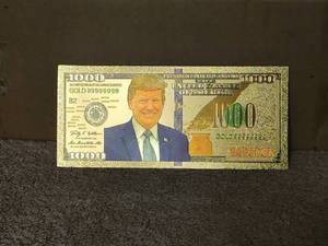 lot 64 image: Collectible gold Donald Trump $1000 bill