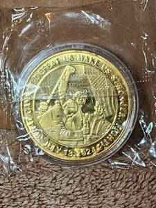 lot 107 image: Collectible gold Donald Trump coin - medallion - What cannot Defeat US makes US stronger