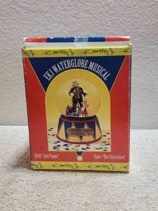 lot 84 image: Collectible vintage Emmett Kelly Jr - porcelain snow globe music box - 9448 Lion Tamer - E. Kelly Jr signed