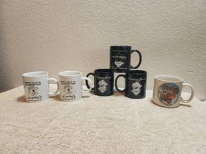 lot 57 image: Collectible Vintage Emmett Kelly Jr. - Coffee Cups - Christmas cup (Santas Stowaway) signed by Emmett Kelly Jr