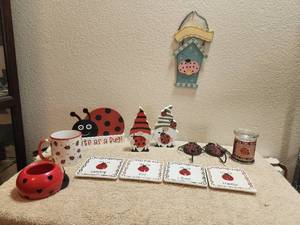 lot 136 image: Selection of ladybug decor.