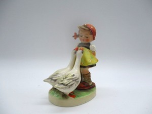 lot 62 image: Goebel Hummel Figurine- Goose Girl - TMK-6 Trademark