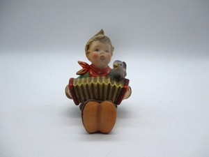 lot 66 image: Goebel Hummel Figurine- Lets Sing- TMK 7 Trademark