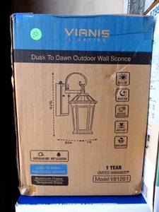 lot 52 image: NEW IN BOX - VIANIS Dusk to Dawn Outdoor Wall Sconce