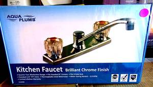 lot 285 image: Aqua Plumb 1550400 8-Inch Two-Handle Polished Chrome Kitchen Faucet NEW