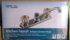 lot 14 image: Aqua Plumb 1550400 8-Inch Two-Handle Polished Chrome Kitchen Faucet NEWSEALED