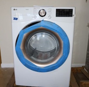 lot 7 image: LG Large cap. Front load electric dryer, model DLEX4000W