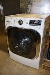 lot 81 image: LG washing machine front load, model WM8000HWA