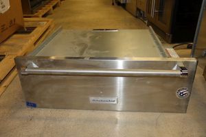 lot 67 image: Kitchen Aid warmer drawer, model KOWT100ESS