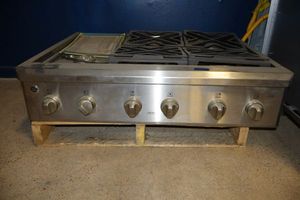 lot 203 image: GE Cafe 36 gas range top, model CGU366SEHSS