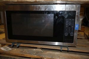 lot 47 image: Amana countertop microwave model AMC4322GS