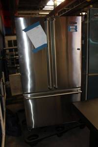 lot 301 image: Refrigerator Freezer (needs right size doors), model RVRF3361SS