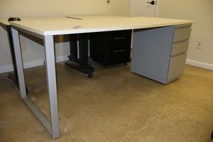 lot 331 image: White long desk with built-in file cabinet as shown (71w x 30d x 30h)