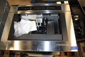lot 124 image: 24 Jenn Air Coffee Maker