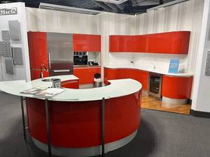 lot 36 image: Red Kitchen Cabinets and Circular Display Counter Set (currently wrapped in plastic sections), see all photos.