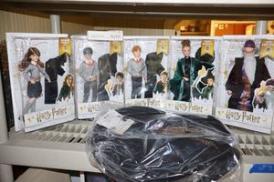 lot 2 image: Harry Potter Dolls and hat (Still in packaging)