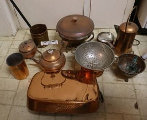 lot 9 image: Copper dishes as shown