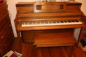 lot 16 image: Lowrey upright piano, see photos