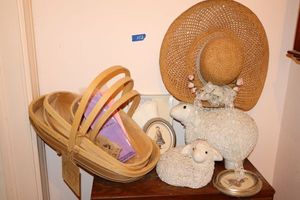 lot 102 image: Nesting baskets, lamb figurines and hat