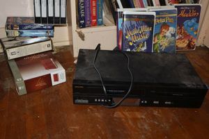 lot 84 image: VHSDVD player, movies and Study Bible