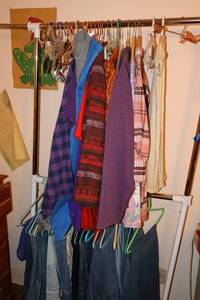 lot 87 image: Clothes rack with Misc. clothes as shown