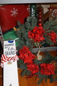 lot 50 image: Christmas decorations and red quilted blanket