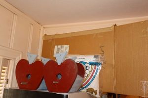 lot 53 image: Craft pillows, apple bird houses