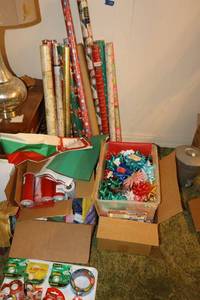 lot 123 image: Generous amount of Christmas gift wrapping supplies