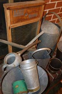 lot 145 image: Galvanized watering cans and buckets with glass washboard