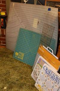 lot 150 image: Quilting books and cutting mats