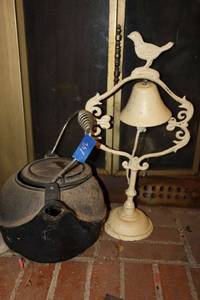 lot 146 image: Iron bell stand and black kettle