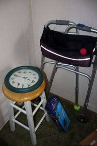 lot 149 image: Walker with replacement wheel, stool seat and clock