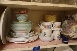 lot 199 image: Corelle flower dishes and tablecloth