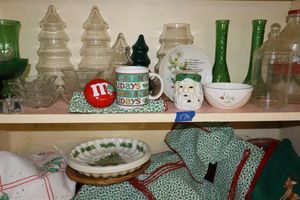 lot 176 image: Christmas table decorations with green glass vases