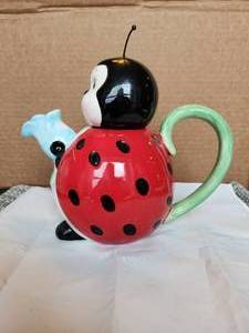 lot 8 image: Vintage ceramic ladybug pitcher with box