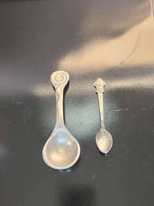 lot 86 image: Collectible vintage spoons - Rolex and pewter spoon