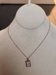 lot 92 image: Vintage gold necklace and charm - 12K gf