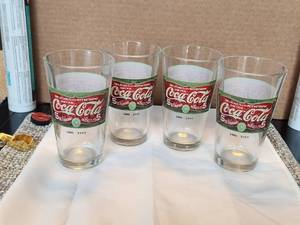 lot 123 image: Selection of 4 collectible glass Coca Cola glasses - celebrating 1886-1919