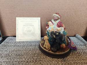 lot 27 image: Collectible Vintage Kelly Jr - Christmas themed Hobo - Babys First Christmas - Bisque porcelain Christmas - E. Kelly Jr. - hand signed initials-signature