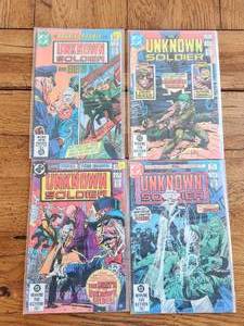 lot 21 image: Vintage Collectible DC Comic - The Unknown Soldier #260, 266, 267, and 268