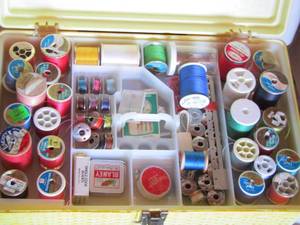 lot 35 image: plastic sewing box with various threads