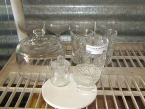 lot 50 image: wine glasses, cake cover, small drinking cups, and more