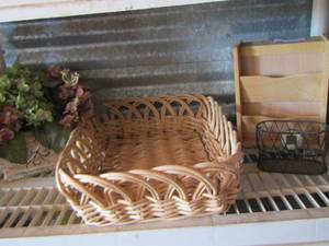 lot 52 image: wicker basket, floral dcor, wooden shelf, small basket