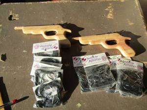 lot 68 image: qty 2 rubber band guns with rubber bands
